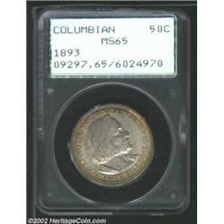 1893 50C Columbian MS65 PCGS. A peripheral band of gold patina frames the lilac centers. A well stru