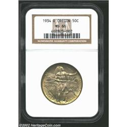 1934-D 50C Oregon MS66 NGC. Soft green-gray patina blankets the underlying highly lustrous surfaces.