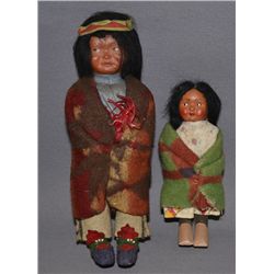 TWO SKOOKUM DOLLS