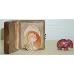 Bag containing early C20th Russian carved rhodonite (orletz) miniature model of...