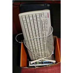 BOX WITH VINTAGE RADIO, ROUTER, AND 2 KEYBOARDS