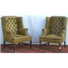 Image 1 : Pair of mahogany & studded green leather button upholstered wing armchairs, on...