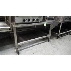 53.5" X 34" STAINLESS STEEL TABLE ON WHEELS