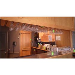 INCLUDES 59 HANGING GLASSES, 4 CARAFFS, 2 PITCHERS, 27 GLASSES ON COUNTER, APPROX 14 SHOOTER GLASSES