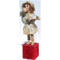 Early C20th French bisque porcelain headed musical automaton doll, the doll...
