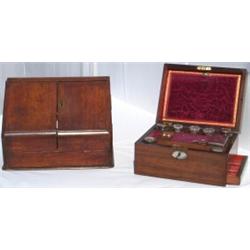 Victorian oak stationery box with hinged sloping doors enclosing fitted...