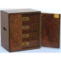 Good quality Victorian burr & figured walnut humidor with 2 doors secured by...