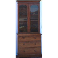 Victorian mahogany bookcase on chest with later cornice above 2 arched glazed...