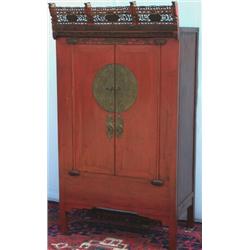 Chinese red lacquer 2-door cabinet with carved cresting, enclosing drawers &...