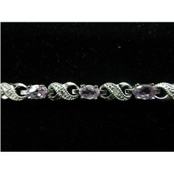 Amethyst & diamond infinity tennis bracelet