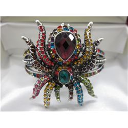 Hand set 20 carat coloured crystal spider bangle