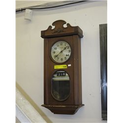 31 Day wall clock w/ Day/Date - wood cased
