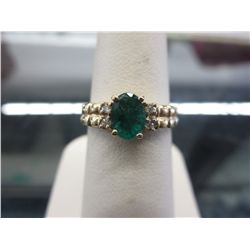 14KT gold VS clarity .80 CT emerald cocktail ring