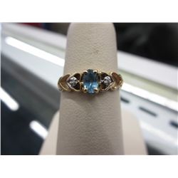 10KT gold half carat blue topaz & diamond ring