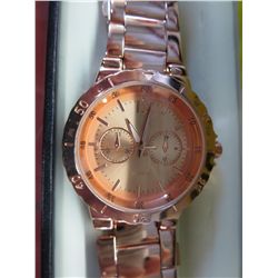 Copper coloured Chatelaine watch