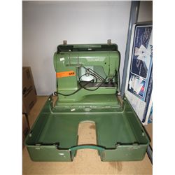Vintage Elna portable sewing machine in case