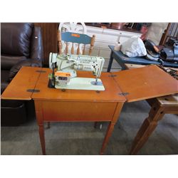 Vintage Sinter sewing machine in cabinet