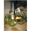 Image 1 : 4 Glass containers containing oils