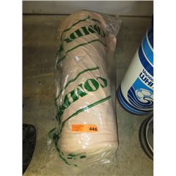 Bolt of beige stretch fabric