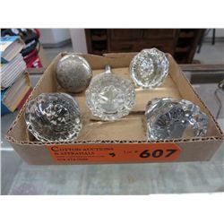 4 Vintage glass doorknobs.