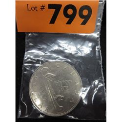 1969 CDN silver dollar