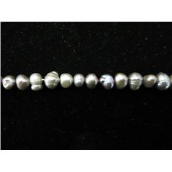 Hand tied silver freshwater pearl 7.5" bracelet