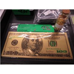 $100 Gold foil bank note & vial of gold leaf.