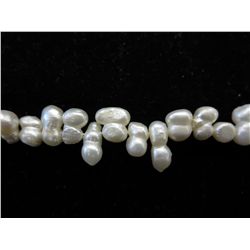 Hand tied white freshwater pearl bracelet