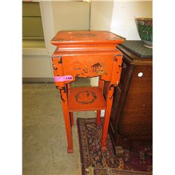 Vintage orange & black oriental accent table