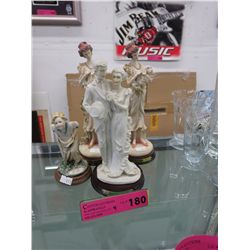 4 Italian figurines - Largest is 9" x 3"