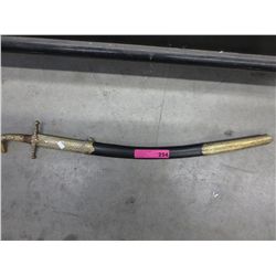 Middle Eastern style scimitar in metal sheath