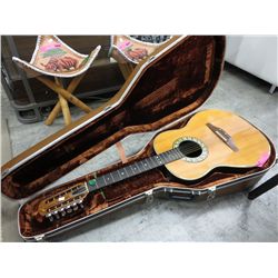 Ovation acoustic guitar in case