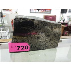 Shiny rock paperweight