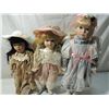 Image 1 : LOT 3 DRESSED UP PORCELAIN DOLLS