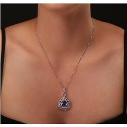 14KT White Gold 5.64ct Tanzanite and Diamond Pendant With Chain