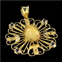 APP: 2.8k 14 kt. Gold, 6.29CT Crystal Opal and Topaz Pendant