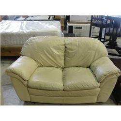 OFF WHITE LEATHER LOVESEAT