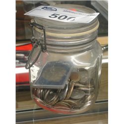 GLASS JAR FILLED WITH ASSORTED WORLD COINS