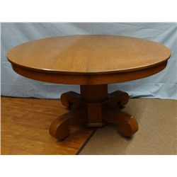 Round oak dining table, 54" w/4 10 " leaves