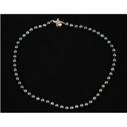 Black Pearl Strand with 14K Clasp.