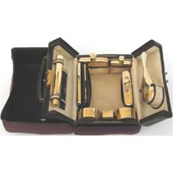 Early C20th gentleman's leather toiletry case with HM silver gilt fittings &...