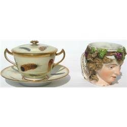 Late C18th Derby porcelain Bacchante mask mug, puce painted crown over 'D`...