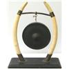 Image 1 : Late C19th / early C20th bronze dinner gong supported by a pair of ivory...