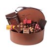 Image 1 : "La Maison du Chocolat's elegance and refinement define this exquisite hatbox presenting a large sel