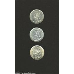 George V 10 Cents including: 1916, KM23 Uncirculated; 1920, KM23a, lightly cleaned Uncirculated; and