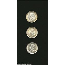 George V 10 Cent trio including: 1914, KM23, Choice AU; 1918, KM23, near-Choice Uncirculated; and a.