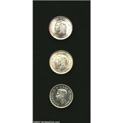 George VI Uncirculated 10 Cents including: 1943, 1944, and 1945, KM34, two with light golden toning.