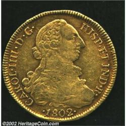 Carlos IIII Gold 8 Escudos 1802JJ, KM54. VF, a few light surface marks. Important notice: We expect.