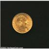 Charles III Gold 20 Francs 1879, K98, AU-UNC, some surface marks on the obverse, still scarce in thi