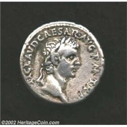 Claudius, 41 - 54 AD, AR denarius (3.7 gm.), Laureate head right/IMPER. RECEPT on a praetorian camp,